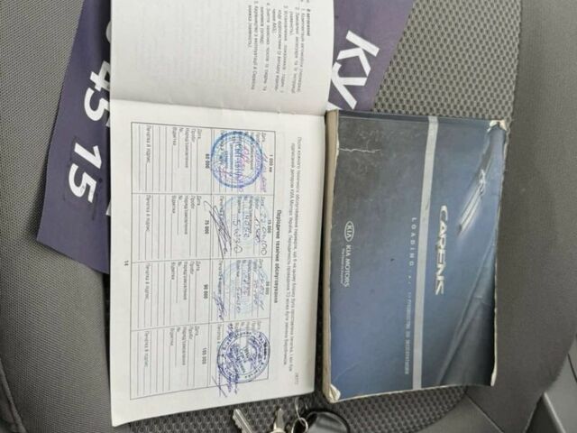 Серый Киа Каренс, объемом двигателя 2 л и пробегом 197 тыс. км за 6499 $, фото 16 на Automoto.ua