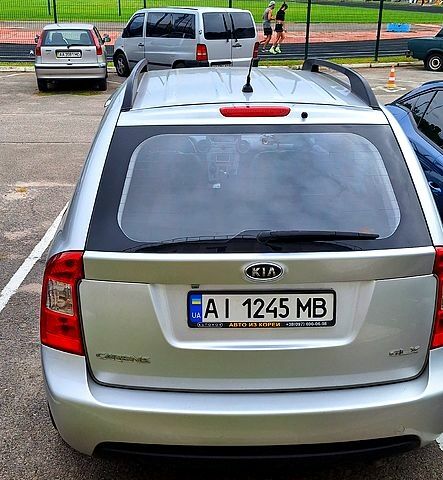 Серый Киа Каренс, объемом двигателя 2 л и пробегом 215 тыс. км за 9300 $, фото 1 на Automoto.ua