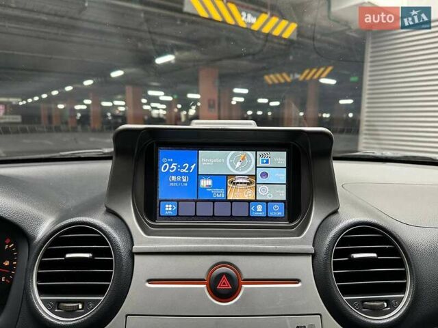 Сірий Кіа Каренс, об'ємом двигуна 2 л та пробігом 215 тис. км за 8990 $, фото 17 на Automoto.ua