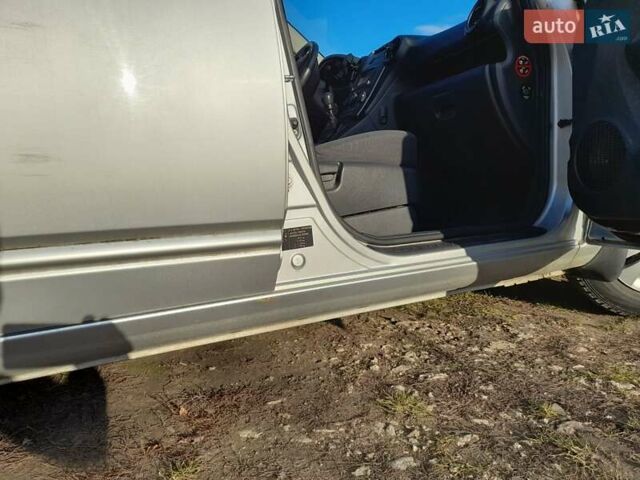 Сірий Кіа Каренс, об'ємом двигуна 1.59 л та пробігом 240 тис. км за 5400 $, фото 63 на Automoto.ua