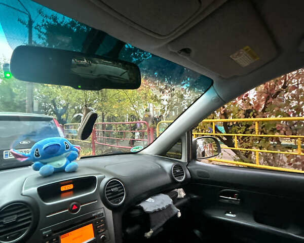 Серый Киа Каренс, объемом двигателя 1.58 л и пробегом 220 тыс. км за 8300 $, фото 22 на Automoto.ua