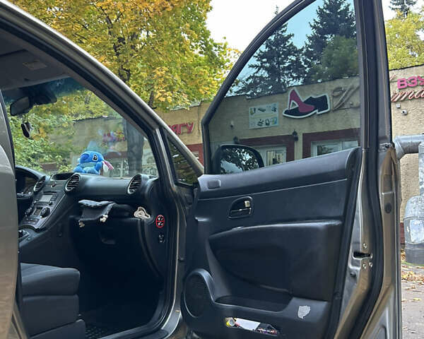 Серый Киа Каренс, объемом двигателя 1.58 л и пробегом 220 тыс. км за 8300 $, фото 17 на Automoto.ua