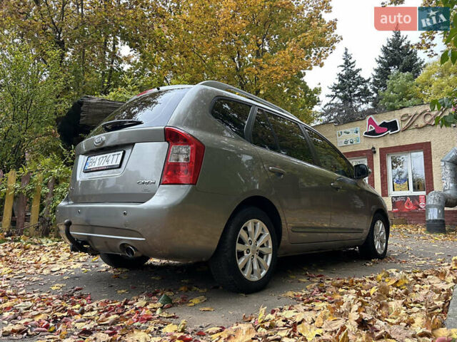 Серый Киа Каренс, объемом двигателя 1.58 л и пробегом 220 тыс. км за 8300 $, фото 5 на Automoto.ua