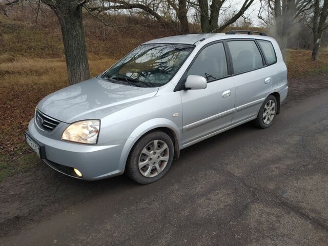 Серый Киа Каренс, объемом двигателя 2 л и пробегом 220 тыс. км за 1850 $, фото 1 на Automoto.ua