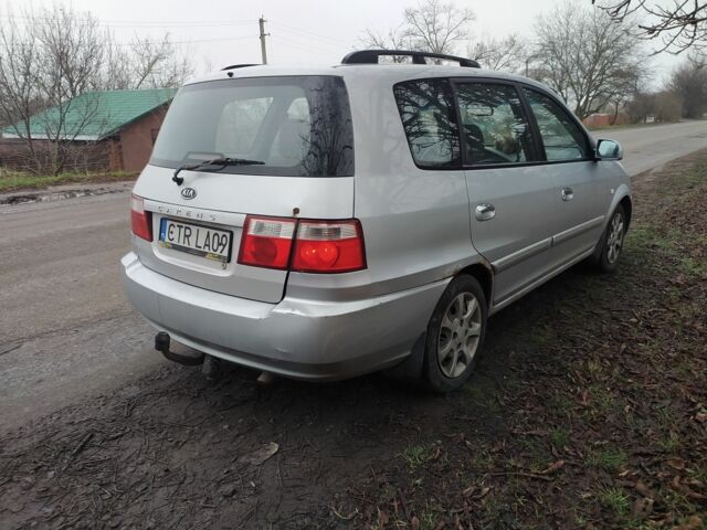 Серый Киа Каренс, объемом двигателя 2 л и пробегом 220 тыс. км за 1850 $, фото 8 на Automoto.ua