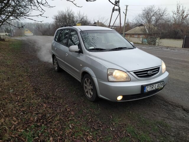 Серый Киа Каренс, объемом двигателя 2 л и пробегом 220 тыс. км за 1850 $, фото 3 на Automoto.ua