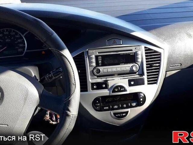 Серый Киа Каренс, объемом двигателя 1.6 л и пробегом 267 тыс. км за 4200 $, фото 6 на Automoto.ua