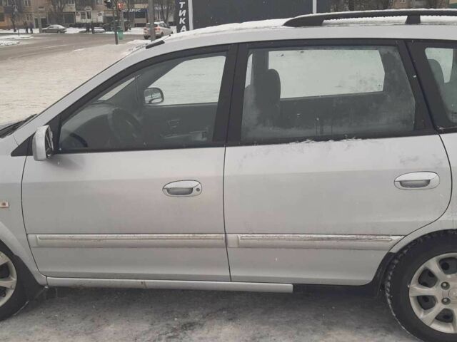 Серый Киа Каренс, объемом двигателя 1.6 л и пробегом 267 тыс. км за 4200 $, фото 3 на Automoto.ua