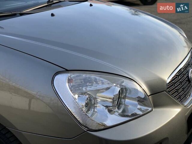 Серый Киа Каренс, объемом двигателя 2 л и пробегом 94 тыс. км за 9700 $, фото 8 на Automoto.ua