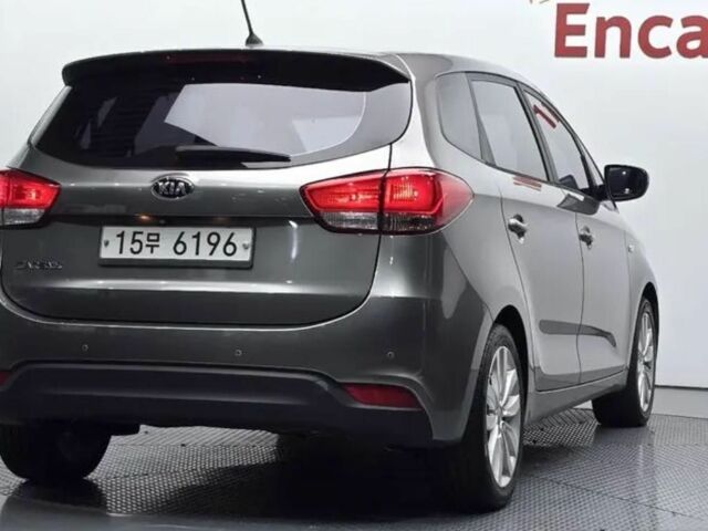 Серый Киа Каренс, объемом двигателя 2 л и пробегом 200 тыс. км за 10500 $, фото 7 на Automoto.ua