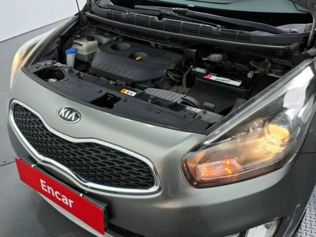 Серый Киа Каренс, объемом двигателя 2 л и пробегом 200 тыс. км за 10500 $, фото 6 на Automoto.ua