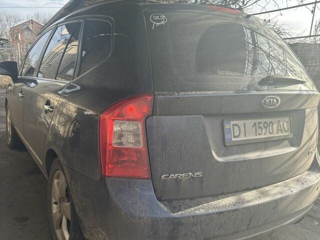 Синий Киа Каренс, объемом двигателя 2 л и пробегом 270 тыс. км за 6100 $, фото 1 на Automoto.ua