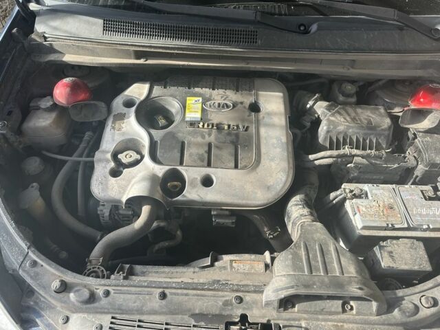 Синий Киа Каренс, объемом двигателя 2 л и пробегом 270 тыс. км за 6100 $, фото 2 на Automoto.ua