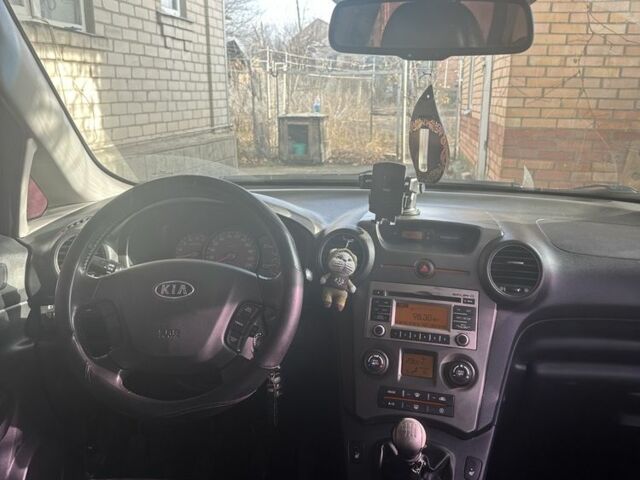 Синий Киа Каренс, объемом двигателя 2 л и пробегом 270 тыс. км за 6100 $, фото 3 на Automoto.ua