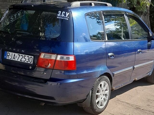 Синий Киа Каренс, объемом двигателя 1.8 л и пробегом 290 тыс. км за 1667 $, фото 1 на Automoto.ua