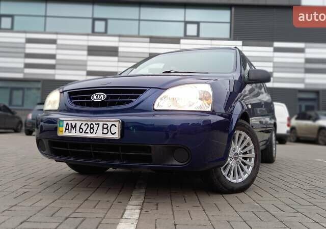 Синий Киа Каренс, объемом двигателя 2 л и пробегом 190 тыс. км за 4800 $, фото 5 на Automoto.ua