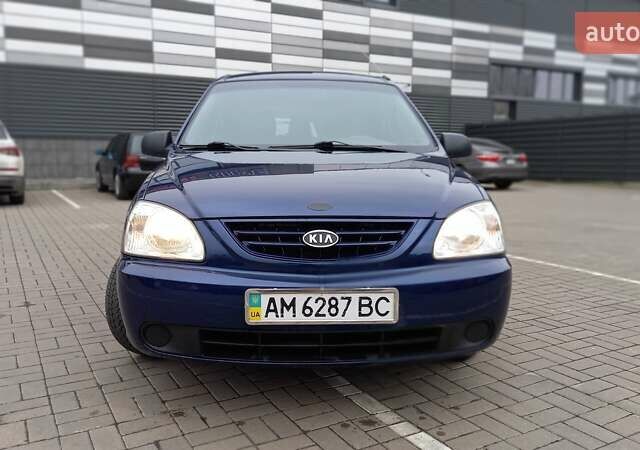 Синий Киа Каренс, объемом двигателя 2 л и пробегом 190 тыс. км за 4800 $, фото 2 на Automoto.ua