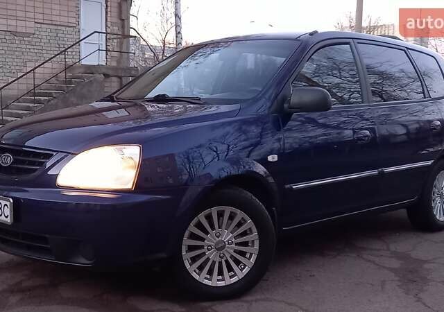 Синий Киа Каренс, объемом двигателя 2 л и пробегом 190 тыс. км за 4700 $, фото 3 на Automoto.ua