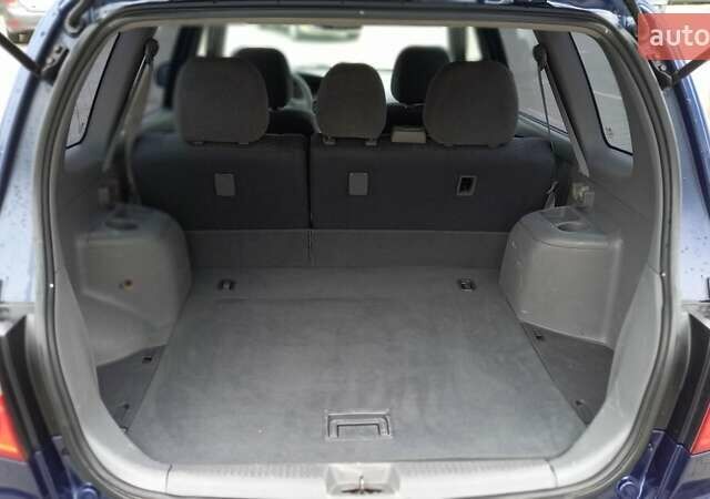 Синий Киа Каренс, объемом двигателя 2 л и пробегом 190 тыс. км за 4800 $, фото 19 на Automoto.ua