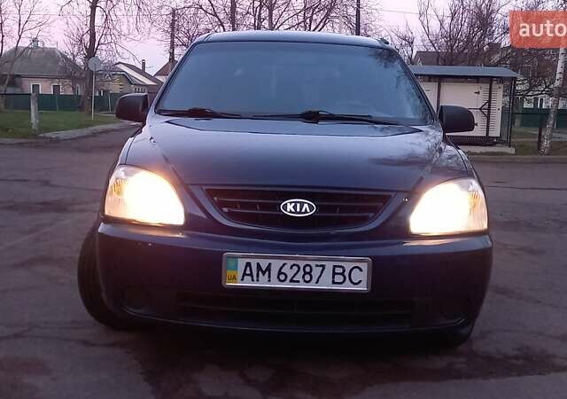 Синий Киа Каренс, объемом двигателя 2 л и пробегом 190 тыс. км за 4700 $, фото 2 на Automoto.ua