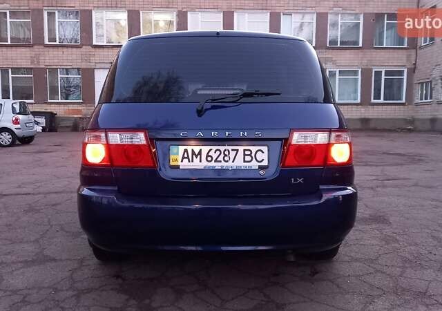 Синий Киа Каренс, объемом двигателя 2 л и пробегом 190 тыс. км за 4700 $, фото 21 на Automoto.ua