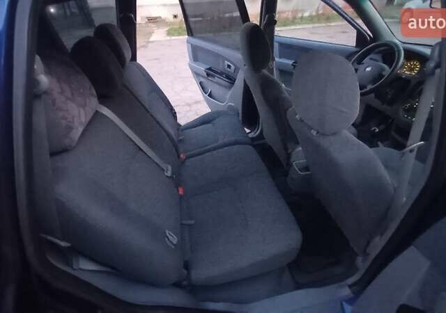 Синий Киа Каренс, объемом двигателя 2 л и пробегом 190 тыс. км за 4700 $, фото 11 на Automoto.ua