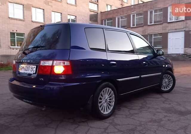 Синий Киа Каренс, объемом двигателя 2 л и пробегом 190 тыс. км за 4700 $, фото 7 на Automoto.ua