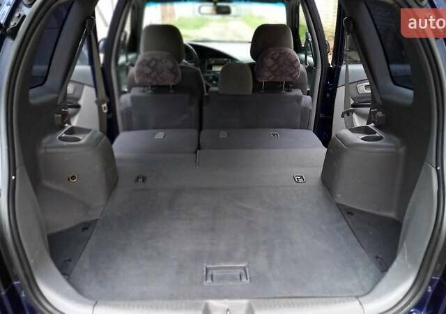 Синий Киа Каренс, объемом двигателя 2 л и пробегом 190 тыс. км за 4800 $, фото 25 на Automoto.ua