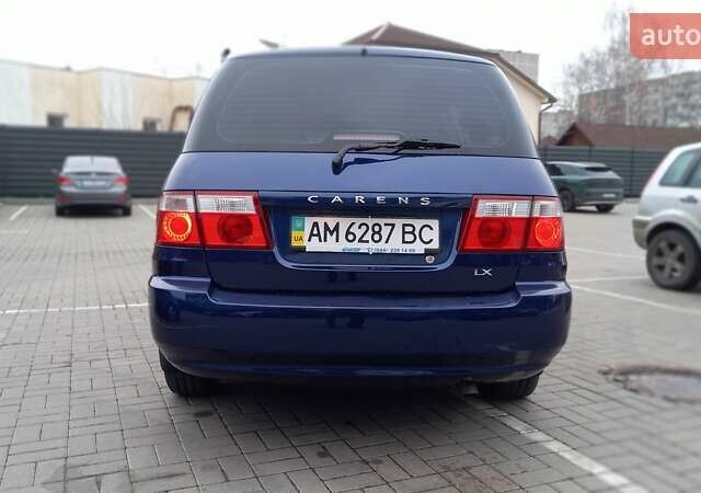 Синий Киа Каренс, объемом двигателя 2 л и пробегом 190 тыс. км за 4800 $, фото 27 на Automoto.ua