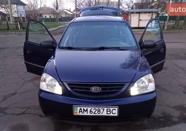 Синий Киа Каренс, объемом двигателя 2 л и пробегом 190 тыс. км за 4700 $, фото 5 на Automoto.ua