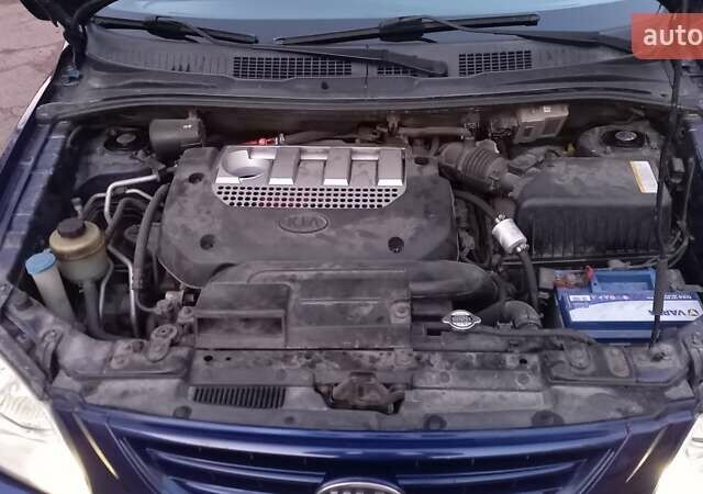 Синий Киа Каренс, объемом двигателя 2 л и пробегом 190 тыс. км за 4700 $, фото 13 на Automoto.ua