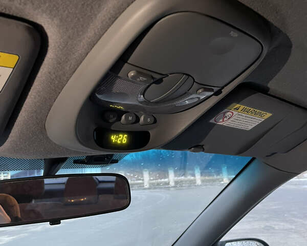 Синий Киа Каренс, объемом двигателя 2 л и пробегом 187 тыс. км за 3900 $, фото 8 на Automoto.ua