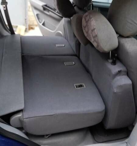 Синий Киа Каренс, объемом двигателя 2 л и пробегом 190 тыс. км за 4800 $, фото 23 на Automoto.ua