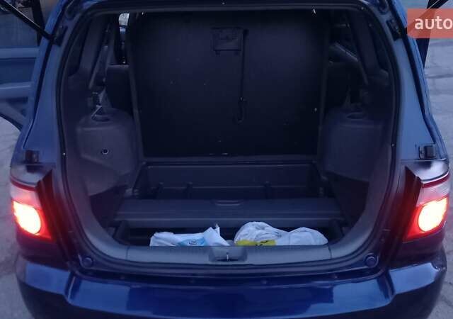 Синий Киа Каренс, объемом двигателя 2 л и пробегом 190 тыс. км за 4700 $, фото 22 на Automoto.ua