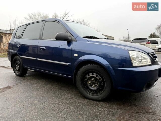 Синій Кіа Каренс, об'ємом двигуна 1.59 л та пробігом 245 тис. км за 4900 $, фото 8 на Automoto.ua