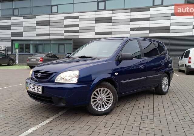 Синий Киа Каренс, объемом двигателя 2 л и пробегом 190 тыс. км за 4800 $, фото 4 на Automoto.ua