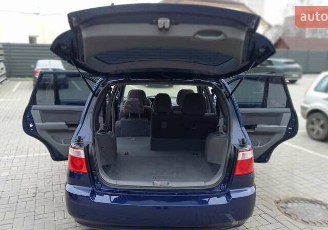 Синий Киа Каренс, объемом двигателя 2 л и пробегом 190 тыс. км за 4800 $, фото 26 на Automoto.ua