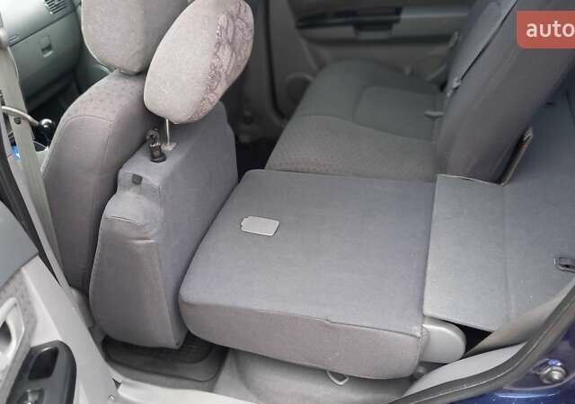 Синий Киа Каренс, объемом двигателя 2 л и пробегом 190 тыс. км за 4800 $, фото 22 на Automoto.ua