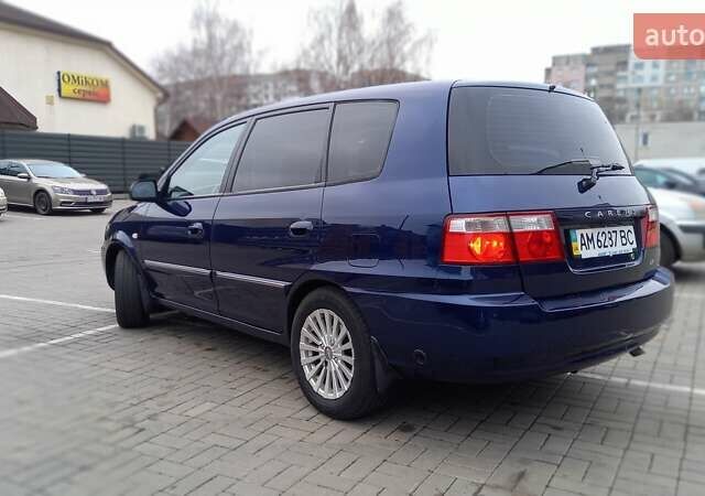 Синий Киа Каренс, объемом двигателя 2 л и пробегом 190 тыс. км за 4800 $, фото 9 на Automoto.ua