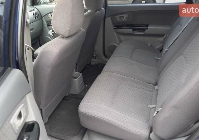 Синий Киа Каренс, объемом двигателя 2 л и пробегом 190 тыс. км за 4800 $, фото 21 на Automoto.ua