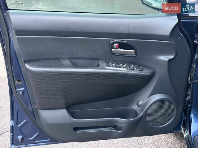 Синий Киа Каренс, объемом двигателя 2 л и пробегом 234 тыс. км за 6990 $, фото 11 на Automoto.ua