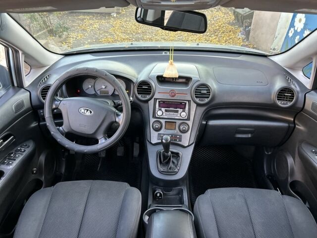 Кіа Каренс 2007 у Новой Одессе на Automoto.ua Синій Кіа Каренс, об'ємом двигуна 2 л та пробігом 278 тис. км за 6200 $, фото 5 на Automoto.ua