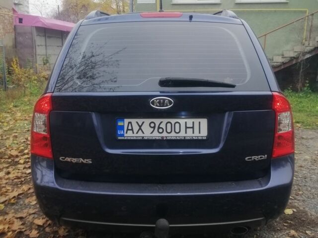 Синий Киа Каренс, объемом двигателя 2 л и пробегом 244 тыс. км за 6000 $, фото 5 на Automoto.ua