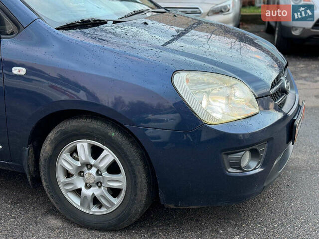 Синий Киа Каренс, объемом двигателя 2 л и пробегом 234 тыс. км за 6990 $, фото 3 на Automoto.ua