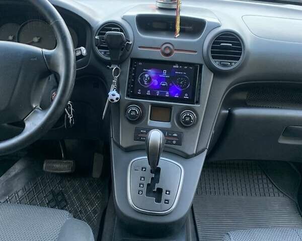 Синий Киа Каренс, объемом двигателя 2 л и пробегом 234 тыс. км за 6500 $, фото 1 на Automoto.ua