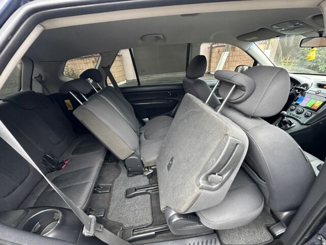 Синій Кіа Каренс, об'ємом двигуна 2 л та пробігом 280 тис. км за 2600 $, фото 9 на Automoto.ua