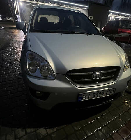 Синий Киа Каренс, объемом двигателя 2 л и пробегом 222 тыс. км за 5500 $, фото 3 на Automoto.ua