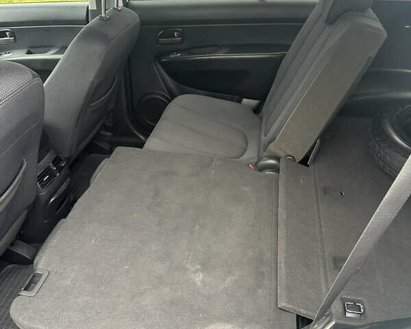 Синій Кіа Каренс, об'ємом двигуна 2 л та пробігом 190 тис. км за 5950 $, фото 14 на Automoto.ua