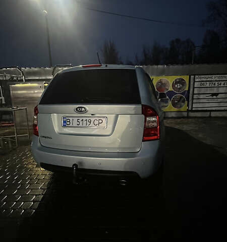 Синий Киа Каренс, объемом двигателя 2 л и пробегом 222 тыс. км за 5500 $, фото 5 на Automoto.ua