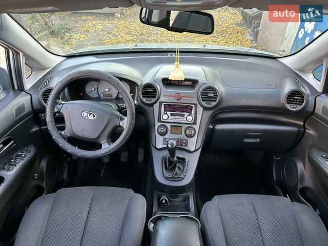 Синий Киа Каренс, объемом двигателя 2 л и пробегом 278 тыс. км за 6200 $, фото 12 на Automoto.ua